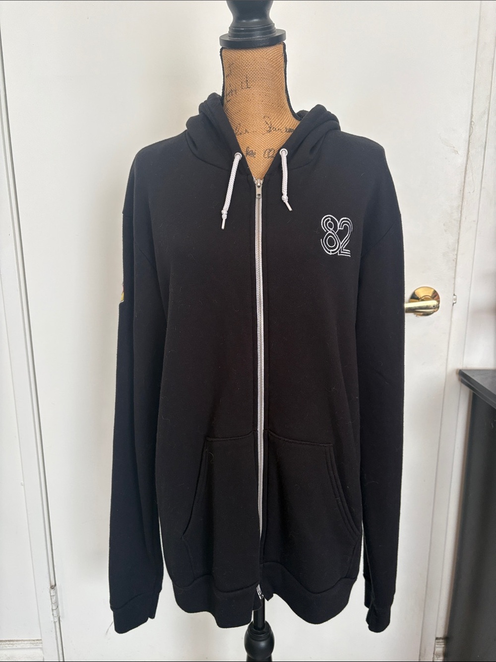 Black Zip-Up Hoodie with '82' Graphic